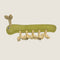 A vibrant green dog toy shaped like a caterpillar, featuring a textured surface and knotted rope-like appendages. The toy has a friendly face with a single eye, designed for interactive play and fetching.
