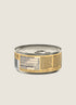 A close-up view of a can of ZIWI Peak Canned Chicken Cat Food featuring a golden label. The back of the can displays detailed nutritional information and ingredient list, emphasizing its high meat content and ethical sourcing.