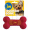 Red bone-shaped dog toy with JW logo on a yellow packaging background featuring a dog.