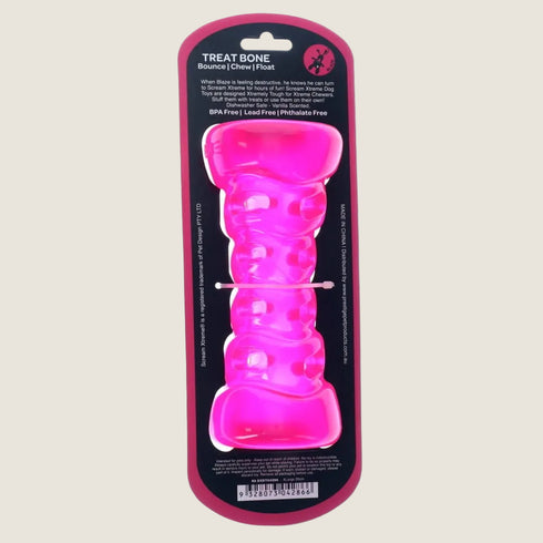 Pink dog chew toy with packaging on a white background