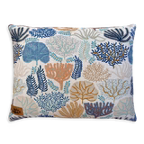 A decorative pillow featuring a vibrant coral reef pattern in various shades of blue, orange, and cream. The design includes intricate illustrations of coral and seaweed, adding a coastal, bohemian touch to any space.