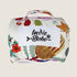 A folded dog travel mat featuring a vibrant, floral design inspired by Australian bush flora. The mat is adorned with colorful illustrations of wildflowers and plants, and has a prominent Indie Boho logo on the front.