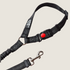 A black anti-shock bungee leash designed for securing pets in car seats, featuring a quick-release buckle and a sturdy clip at one end. The leash has reflective stitching for visibility and is suitable for use with travel mats.