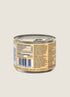 A can of ZIWI Peak Canned Chicken Dog Food is shown from a slight angle, highlighting the label on the back. The label features detailed nutritional information, ingredients, and the products ethical sourcing claims.
