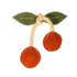 A plush dog toy designed to resemble a cherry, featuring two round red fruit shapes attached to a beige rope stem, with green felt leaves on top. The toy is suitable for puppies and engages them in playful activities.